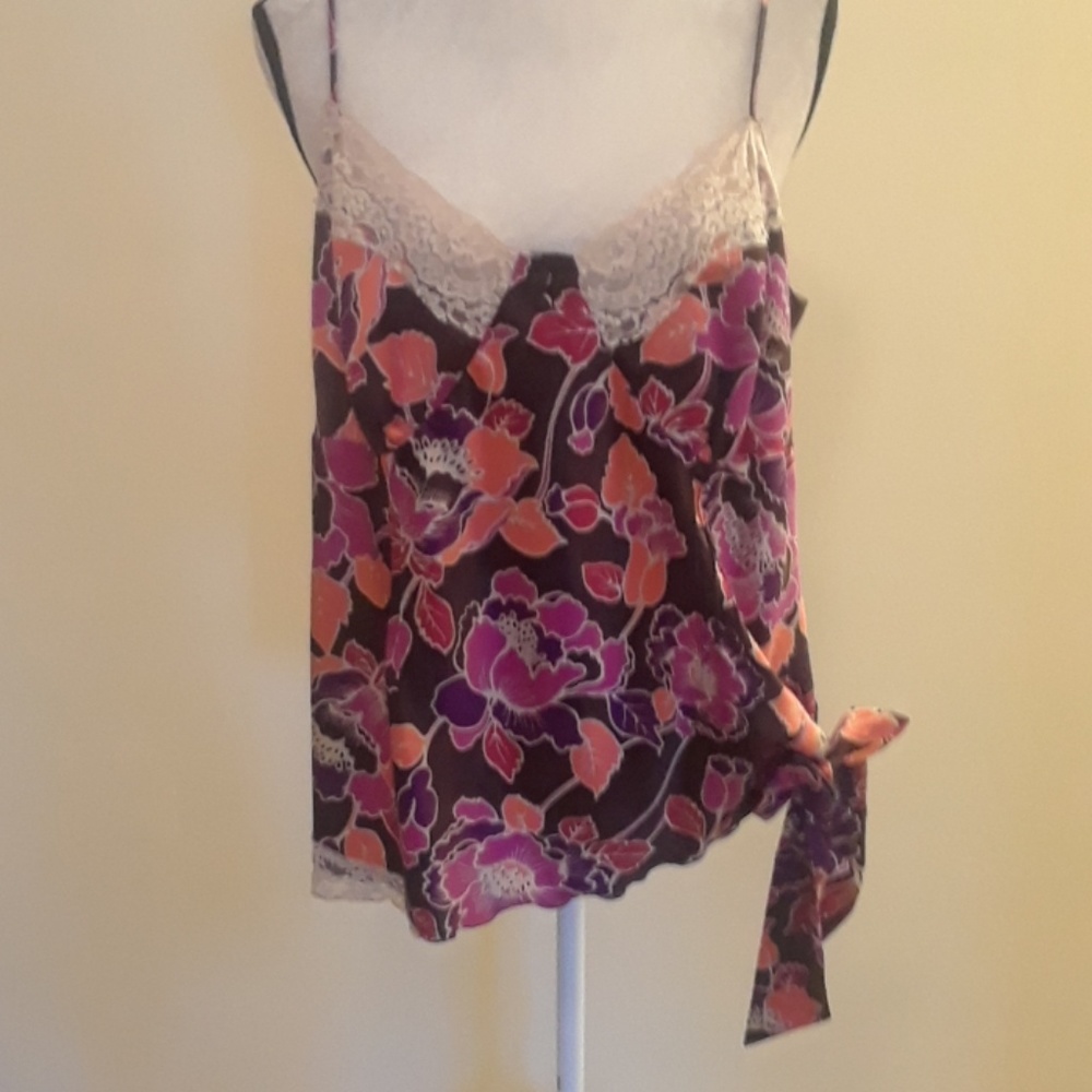 Mixit blouse spaghetti straps embedded with lace .